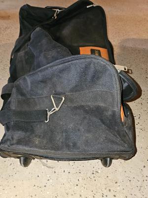 World tour rolling duffle bag with bud light cooler bag