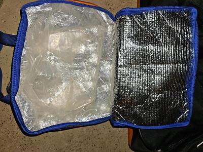World tour rolling duffle bag with bud light cooler bag