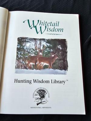 North American hunting Club books and a Collectors series coin