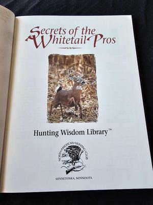North American hunting Club books and a Collectors series coin