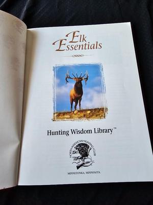 North American hunting Club books and a Collectors series coin