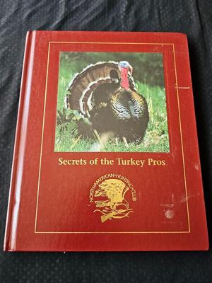 North American hunting Club books and a Collectors series coin