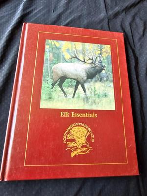 North American hunting Club books and a Collectors series coin