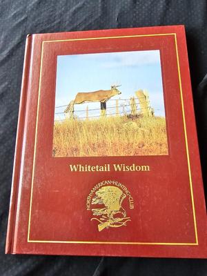 North American hunting Club books and a Collectors series coin