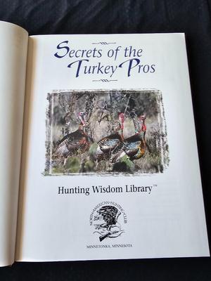 North American hunting Club books and a Collectors series coin