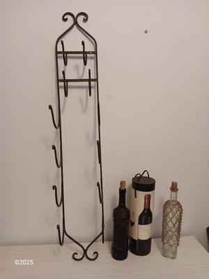 Collectable bottles with wall mount metal wine rack and wine box