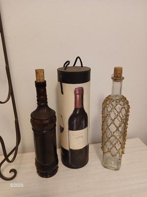 Collectable bottles with wall mount metal wine rack and wine box