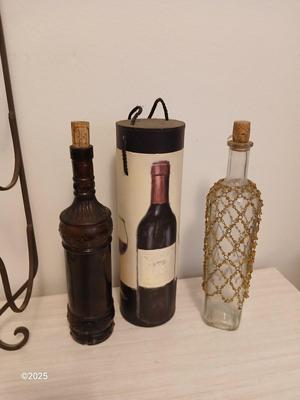 Collectable bottles with wall mount metal wine rack and wine box