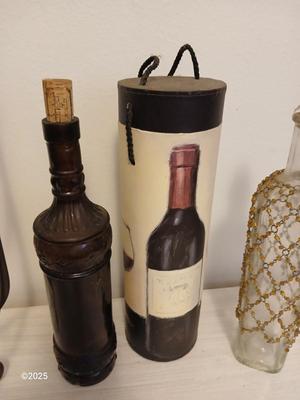 Collectable bottles with wall mount metal wine rack and wine box