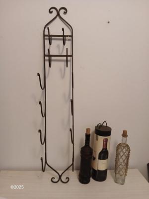 Collectable bottles with wall mount metal wine rack and wine box