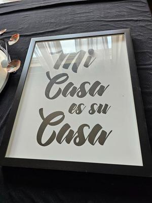 Metal art deco mirror and Mi Casa es su Casa wall art