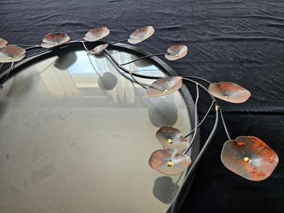 Metal art deco mirror and Mi Casa es su Casa wall art