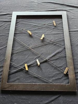 Wall clock with two metal frame picture hanging displays / wall art