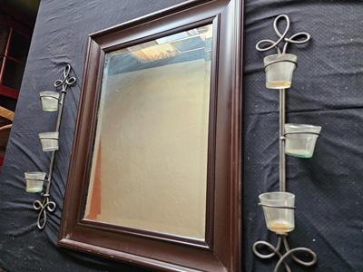 Framed mirror with two matching metal candle sconces / glass cups
