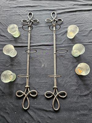 Framed mirror with two matching metal candle sconces / glass cups