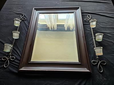 Framed mirror with two matching metal candle sconces / glass cups