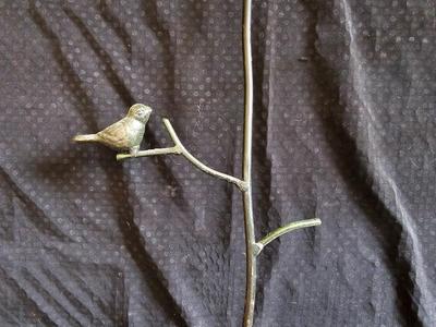 Two metal Jewelry stands with bird accentted decor