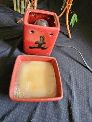 Bamboo vase, candle holders, and a scensy burner