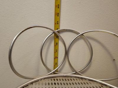 Small metal stool with two matching folding racks