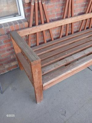 Large wooden patio bench