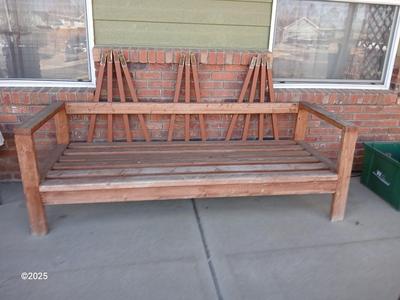 Large wooden patio bench