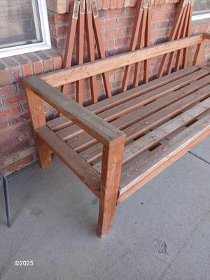 Large wooden patio bench