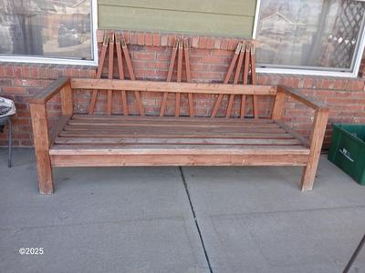 Large wooden patio bench