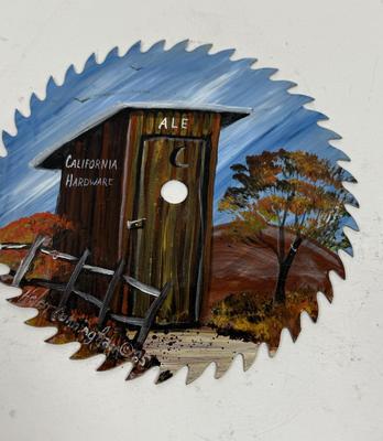 Sale Photo Thumbnail #65: Whimsical painting of an outhouse in a field.  Good condition. Approx. 7" across.