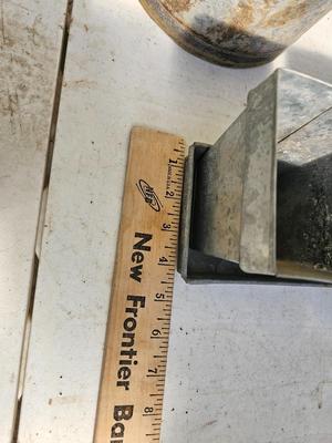 Galvanized watering can, waterer with a pout, and three herb pots with a tray