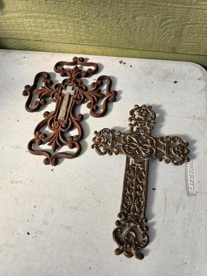 Two rustic cast Iron crosses