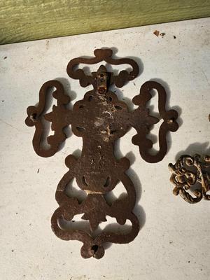 Two rustic cast Iron crosses