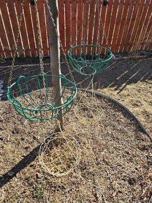 Four metal hanging pots