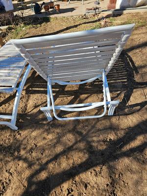 Two folding Chaise lounge chairs with adjustable backs