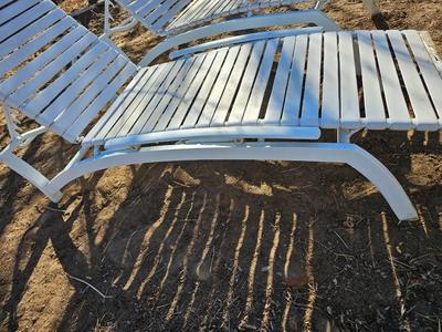 Two folding Chaise lounge chairs with adjustable backs