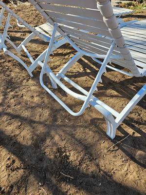 Two folding Chaise lounge chairs with adjustable backs