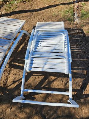 Two folding Chaise lounge chairs with adjustable backs