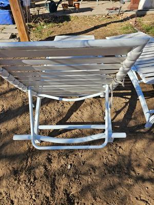 Two folding Chaise lounge chairs with adjustable backs
