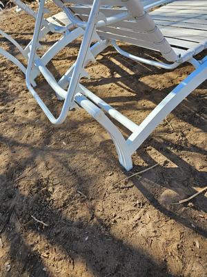 Two folding Chaise lounge chairs with adjustable backs