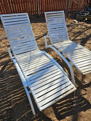 Two folding Chaise lounge chairs with adjustable backs