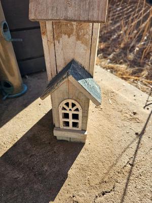 Grouping of Bird feeders and small wooden bird houses
