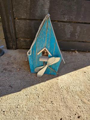 Grouping of Bird feeders and small wooden bird houses