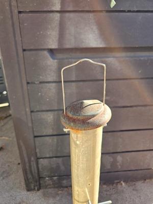 Grouping of Bird feeders and small wooden bird houses