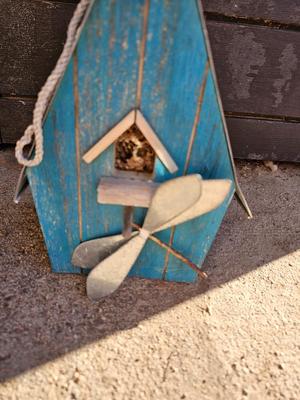 Grouping of Bird feeders and small wooden bird houses