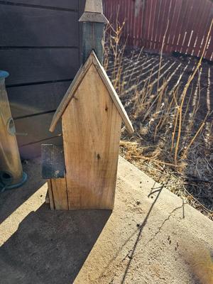Grouping of Bird feeders and small wooden bird houses