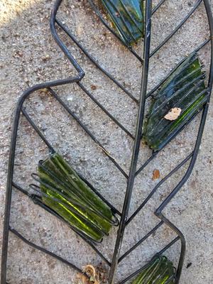 Two leaf like wall shelves with a old man - leaf man wall shelf