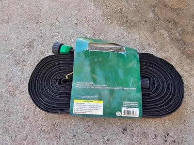 3/4" soaker hose new with plant accessories and other gardening must haves!