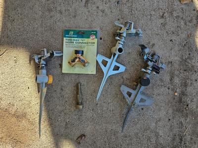 Three Sprinklers and a new 3-way hose connector with a brass hose nozzle