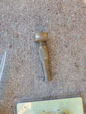 Three Sprinklers and a new 3-way hose connector with a brass hose nozzle