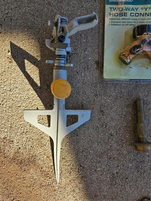 Three Sprinklers and a new 3-way hose connector with a brass hose nozzle