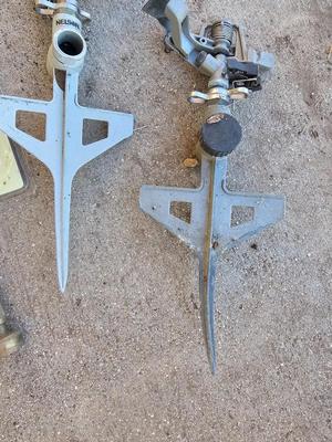 Three Sprinklers and a new 3-way hose connector with a brass hose nozzle